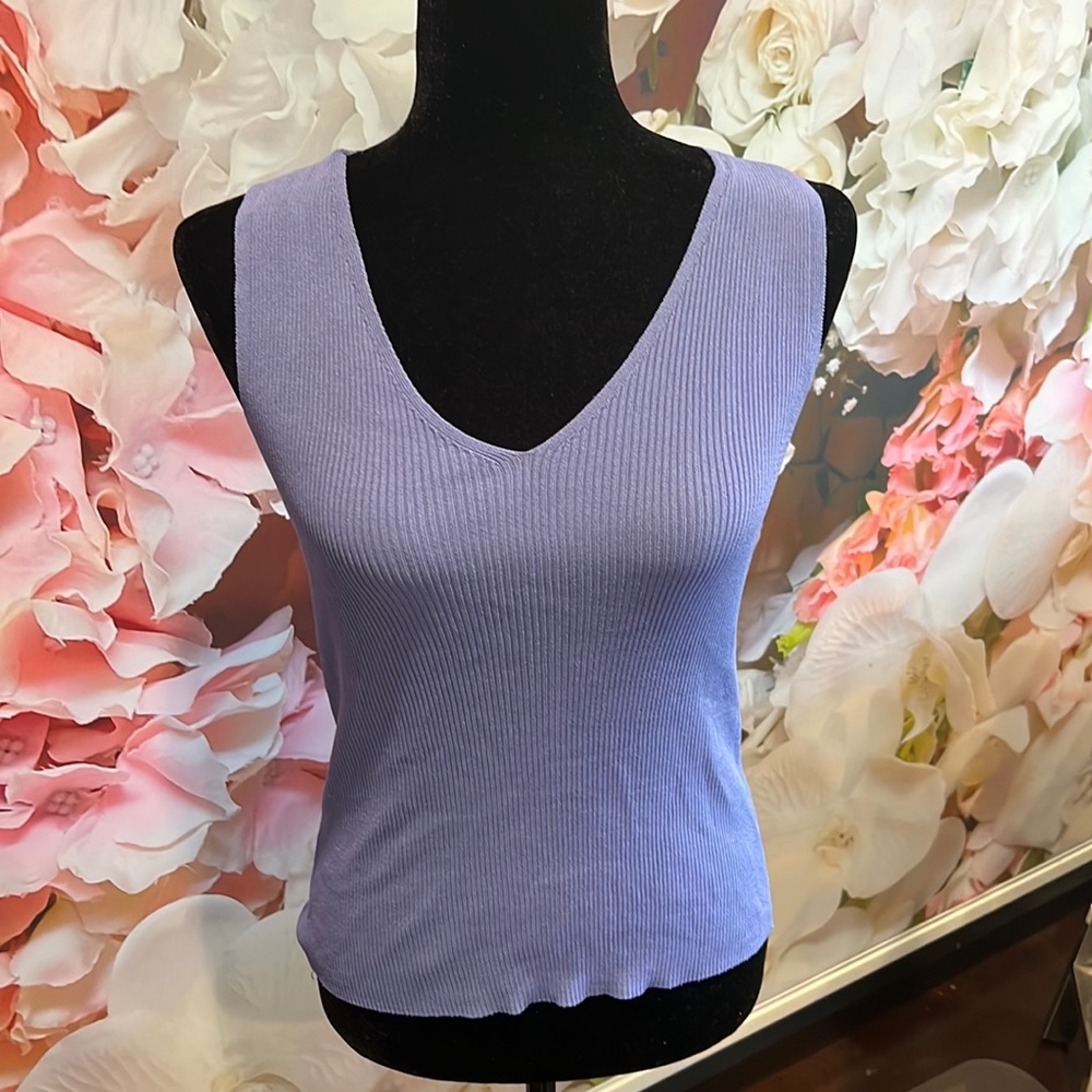 cute periwinkle colored top with a cute back
